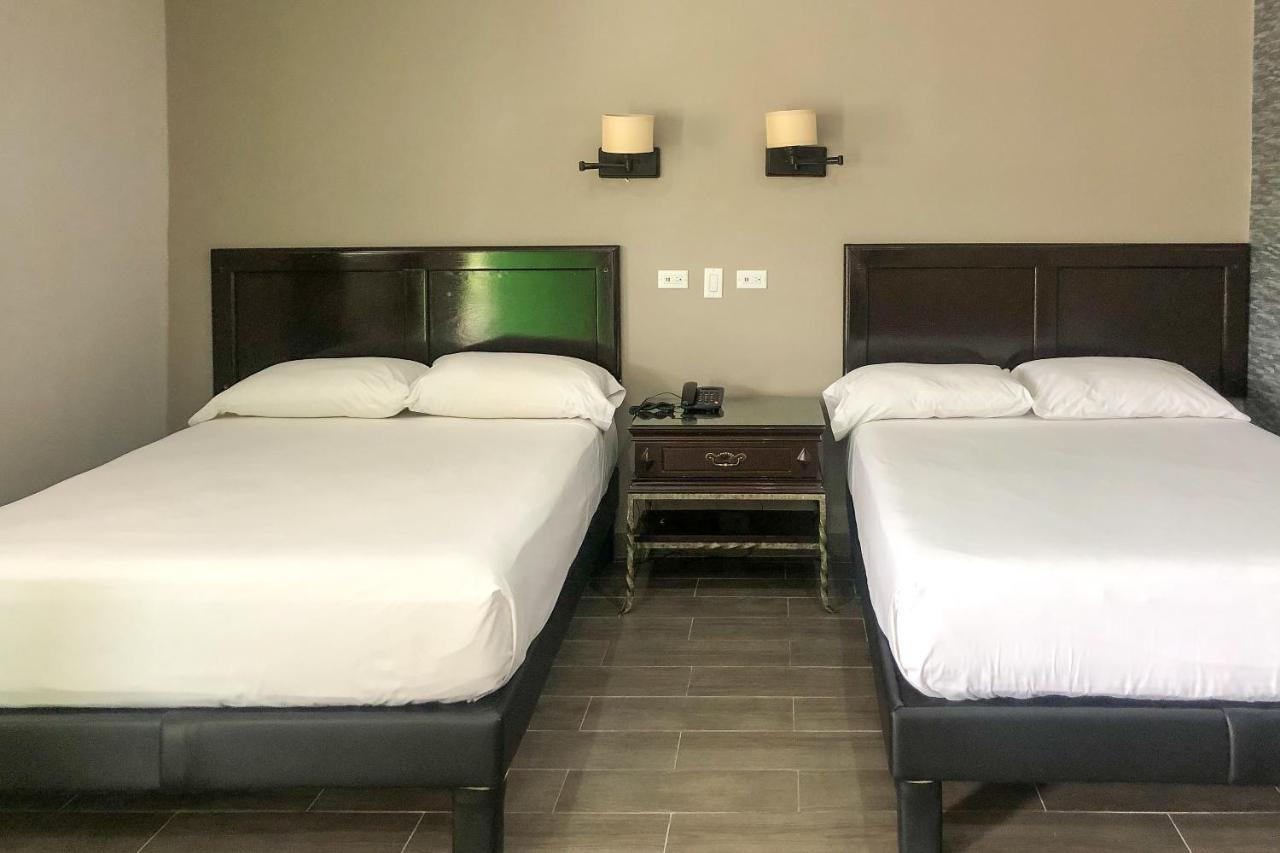 Capital O Palms Hotel, Acuna Ciudad Acuña 外观 照片