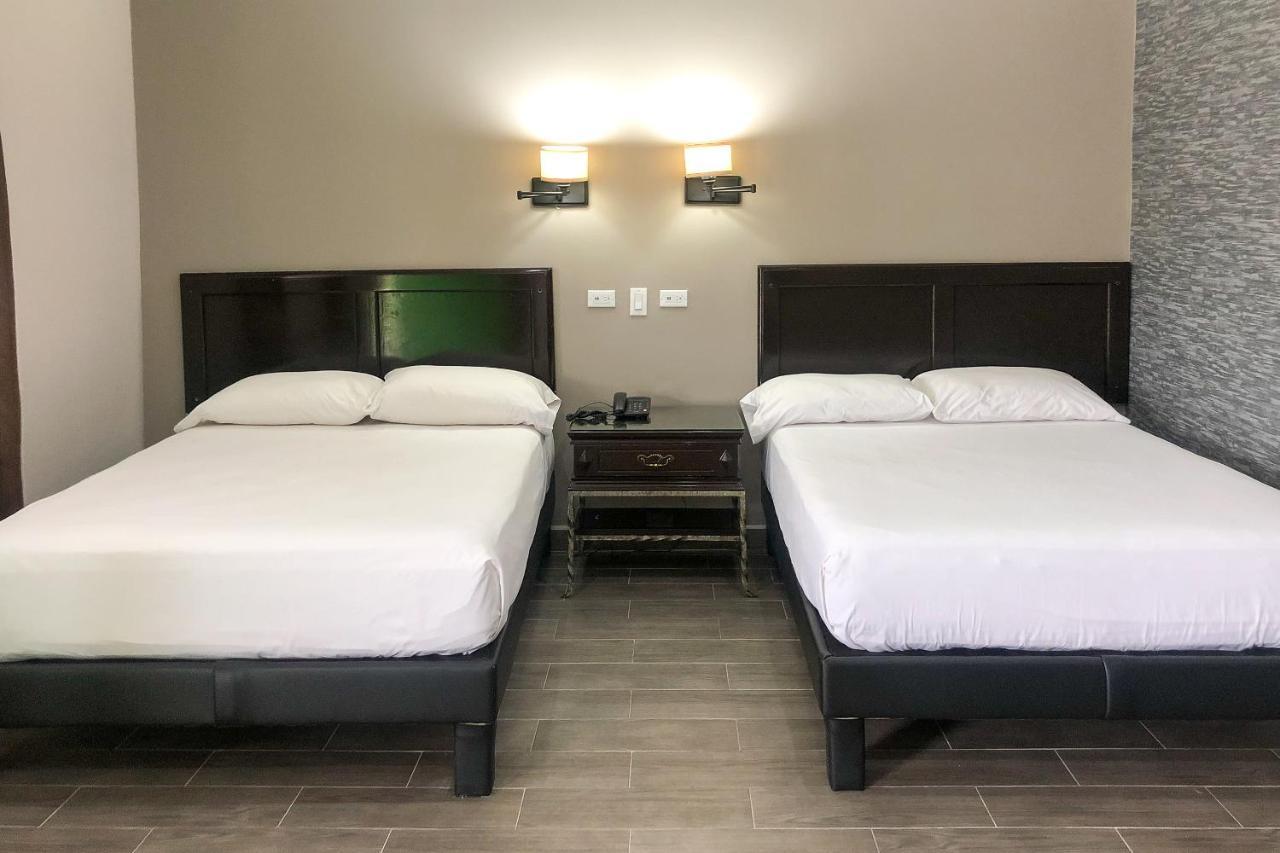 Capital O Palms Hotel, Acuna Ciudad Acuña 外观 照片
