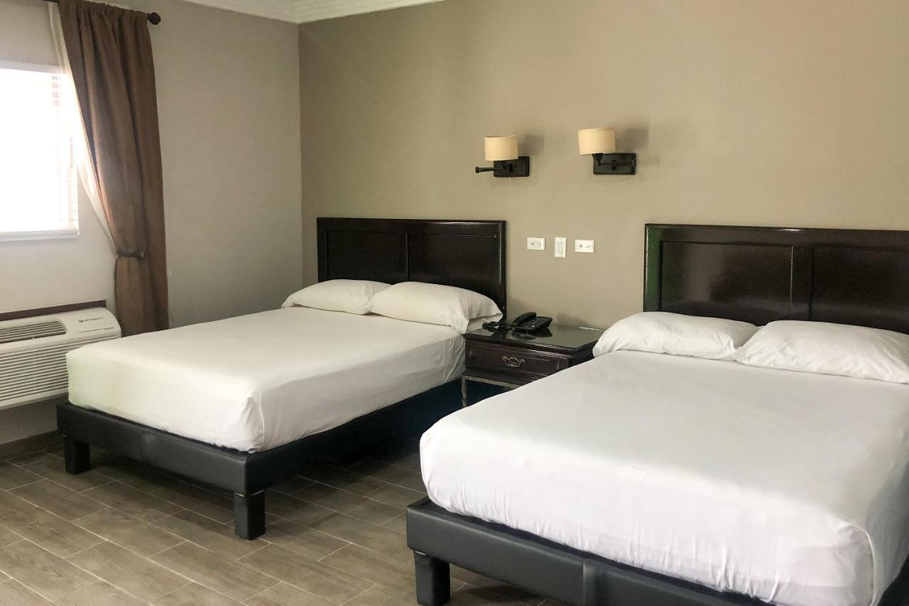 Capital O Palms Hotel, Acuna Ciudad Acuña 外观 照片