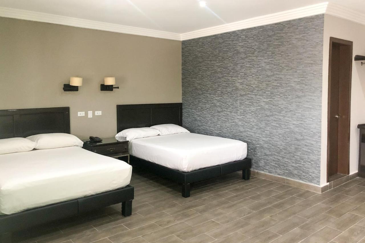 Capital O Palms Hotel, Acuna Ciudad Acuña 外观 照片